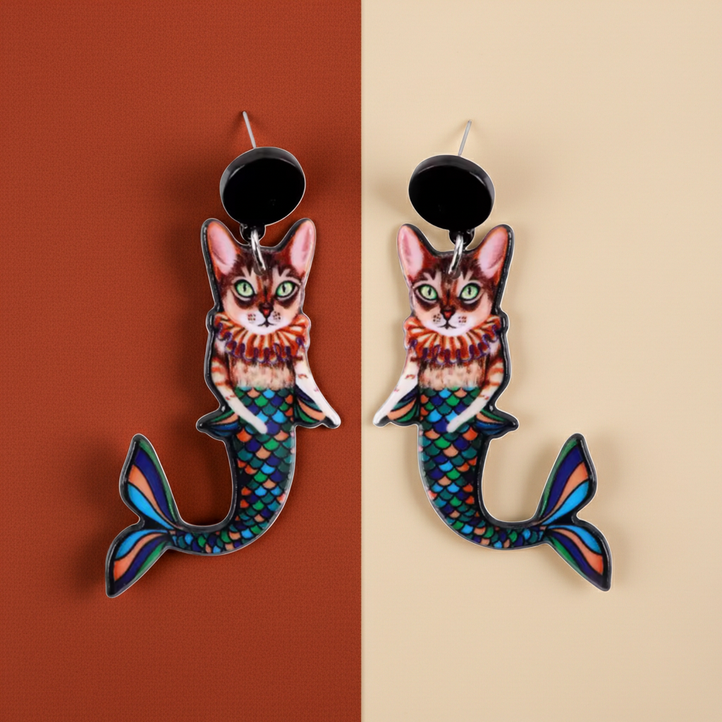 Cat mermaid earrings on a two-tone background