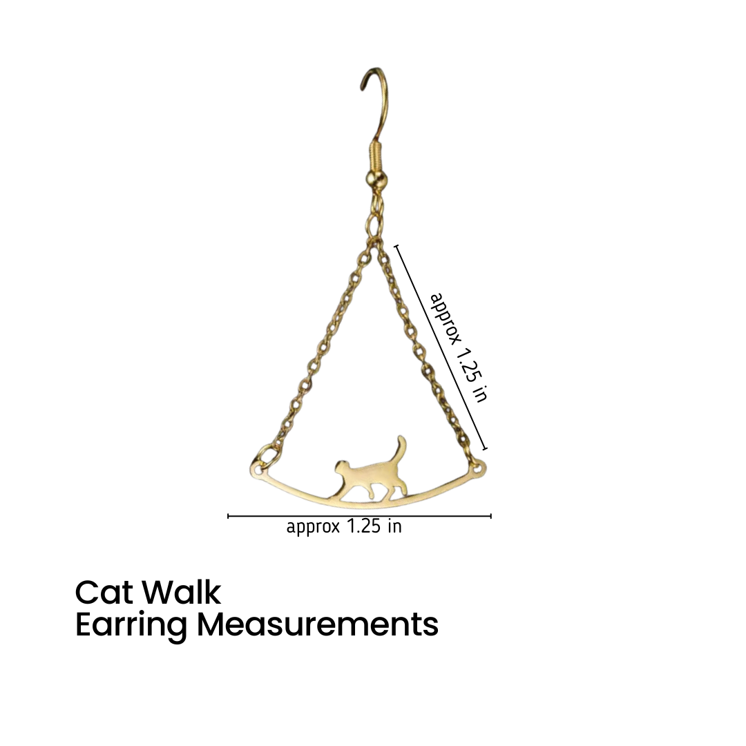 Gold dangling earring with a curved chain and cat silhouette charm, shown on a white background with measurement labels reading approximately 1.25 inches.