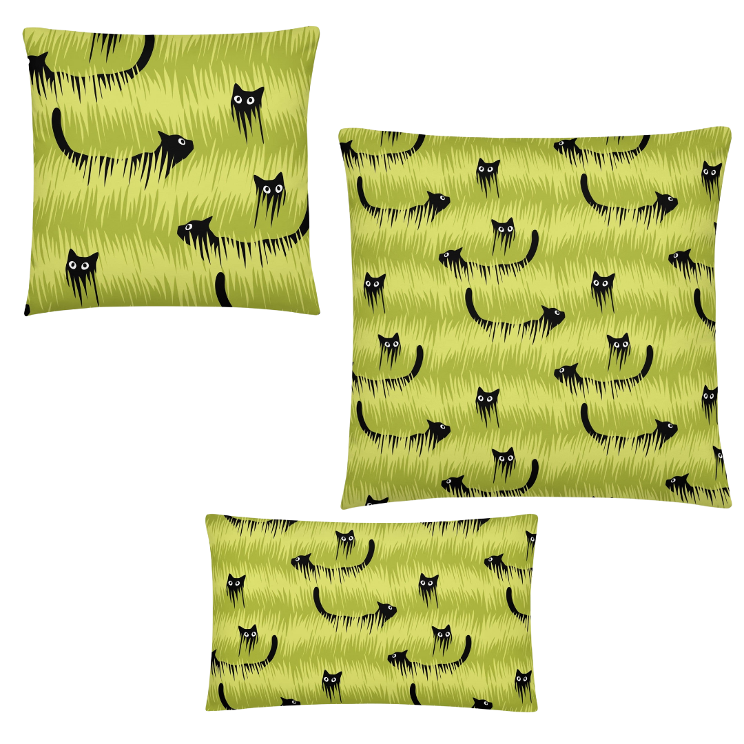 Three green pillows with black cat pattern on a white background