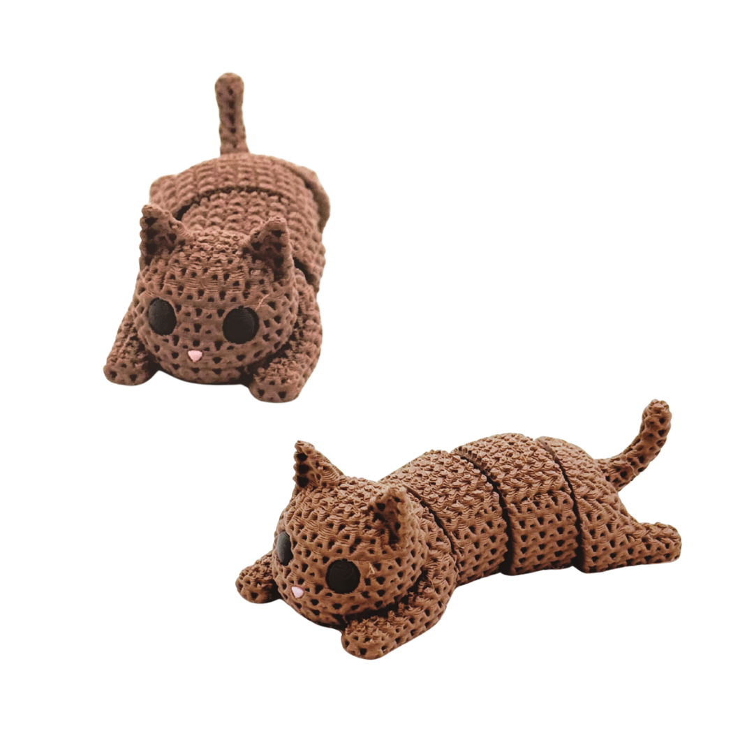 Two brown crochet cat fidget desk toys on a white background
