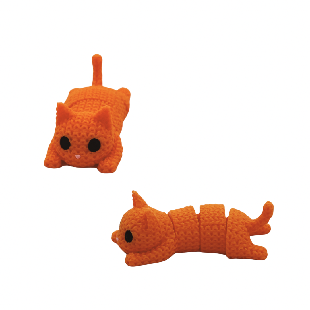 Two orange crochet cat fidget desk toys on a white background