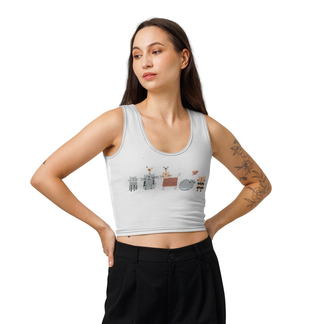 Woman wearing a grey tank top with Square Cats design and black wide-leg pants on a white background