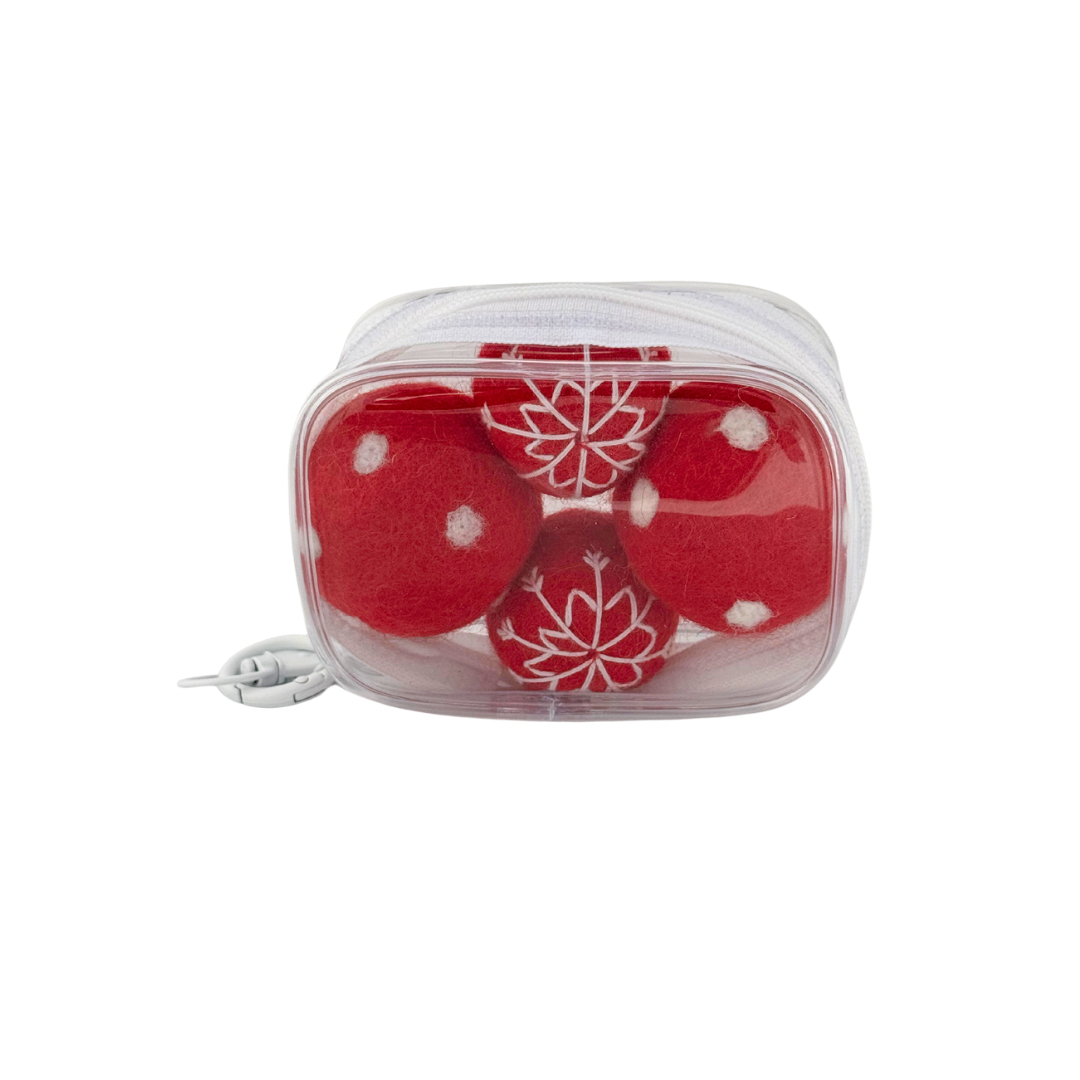 Red and white floral-patterned cat toys in a clear plastic container on a white background