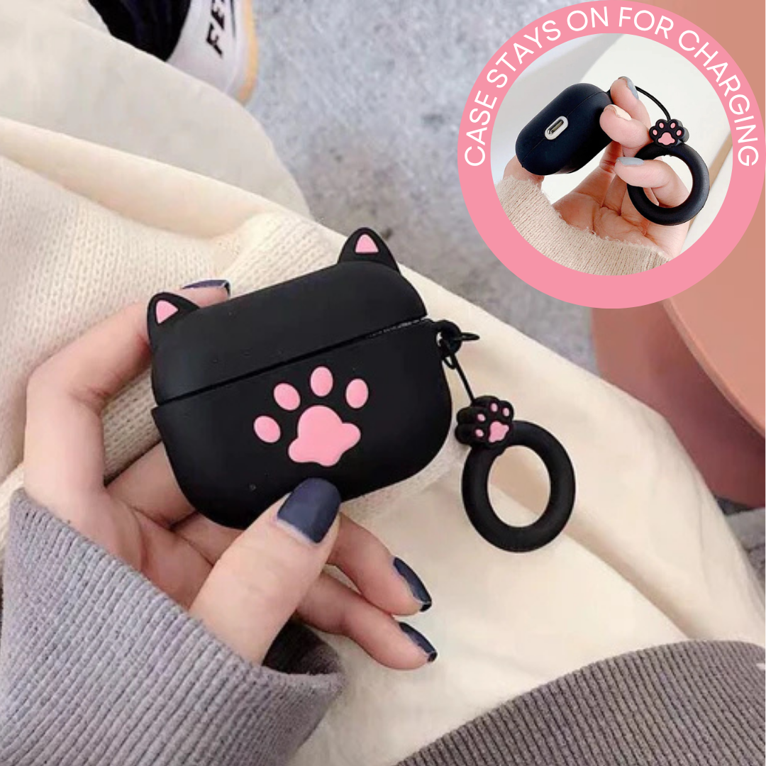 Black cat-shaped airpod case with pink paw print held by a hand, inset showing charging feature.