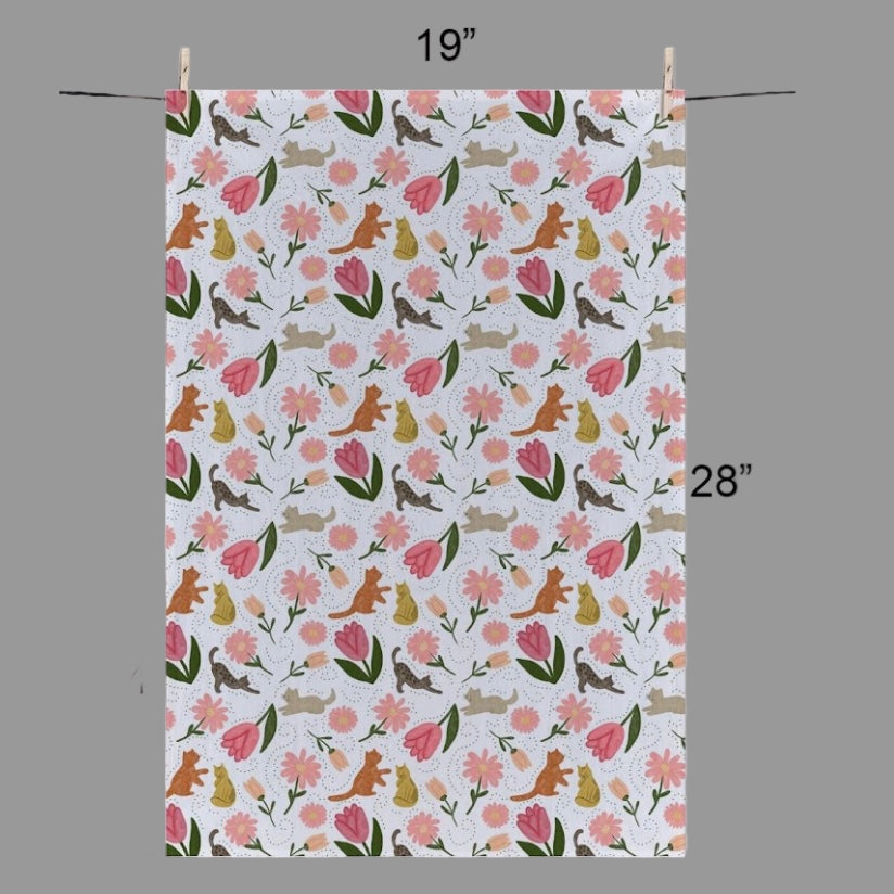Adorable brown and orange cats frolic among pink tulips and other spring flowers in this delightful Cat Tea Towel.