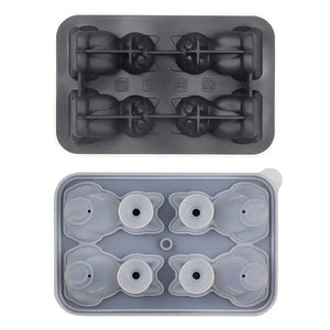 Cat shaped ice cube mold featured on white background