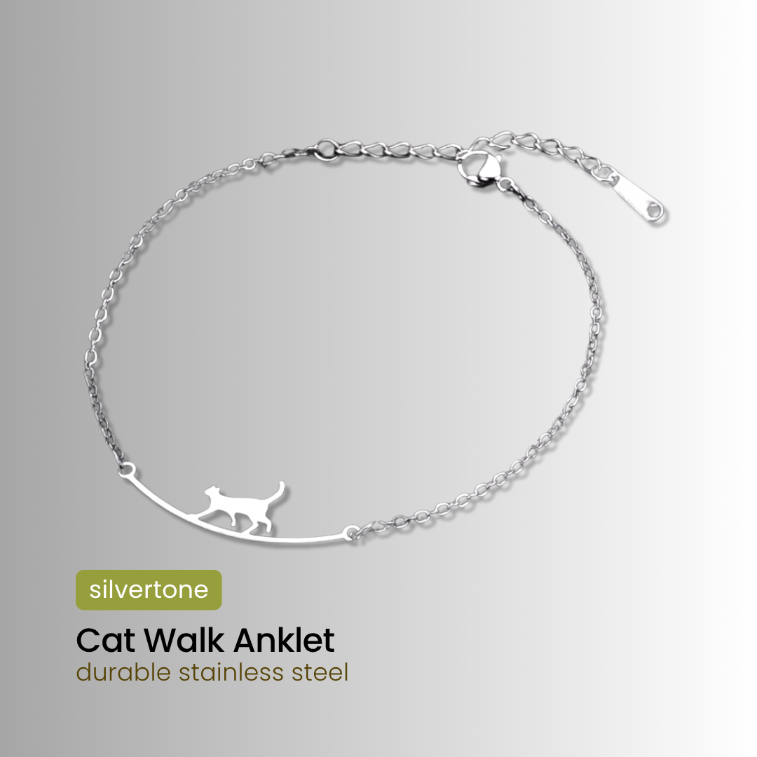 Silver cat walk anklet on a gray background