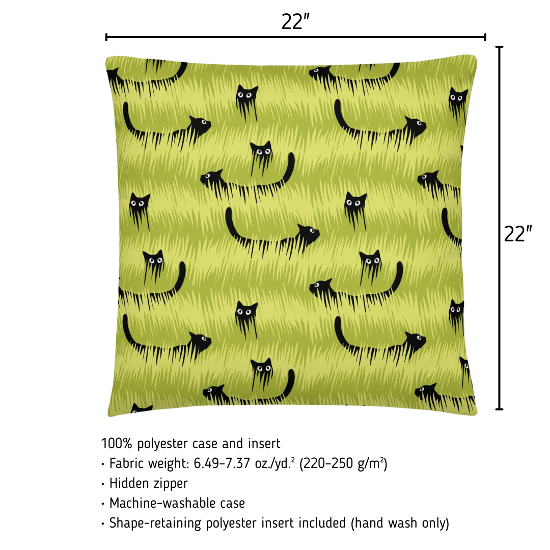 Green pillow with black cat pattern and measurements on a white background