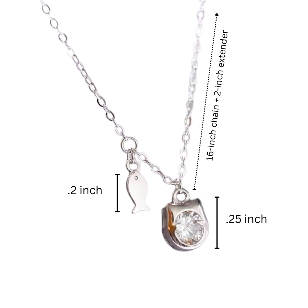 Necklace with a clear pendant and chain measurements on a white background