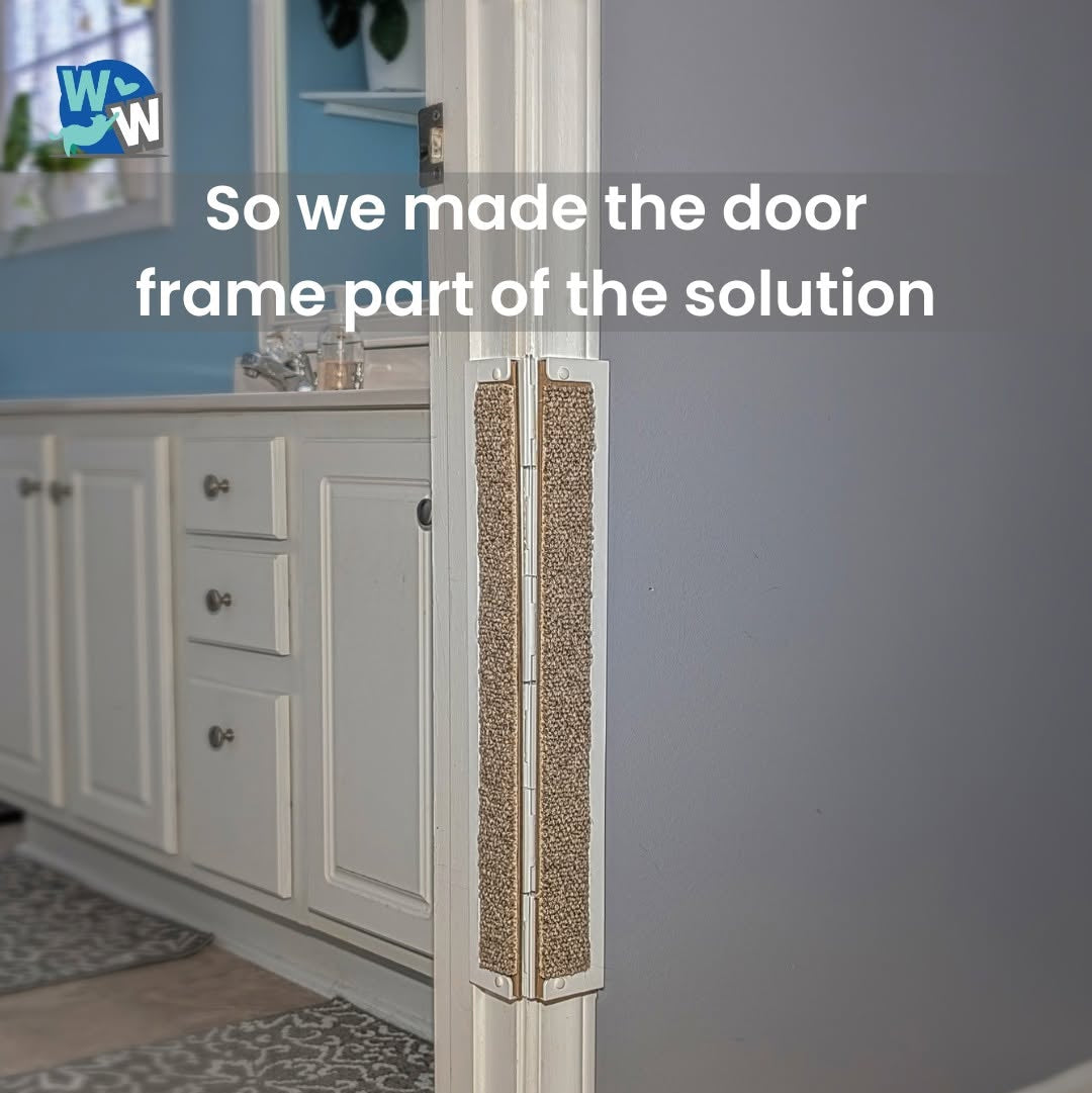 A close-up of a white interior door frame with textured tan protective pads installed along the hinge area, shown in a real room with gray walls, cabinetry, and a rug. White text across the top reads, 'So we made the door frame part of the solution.