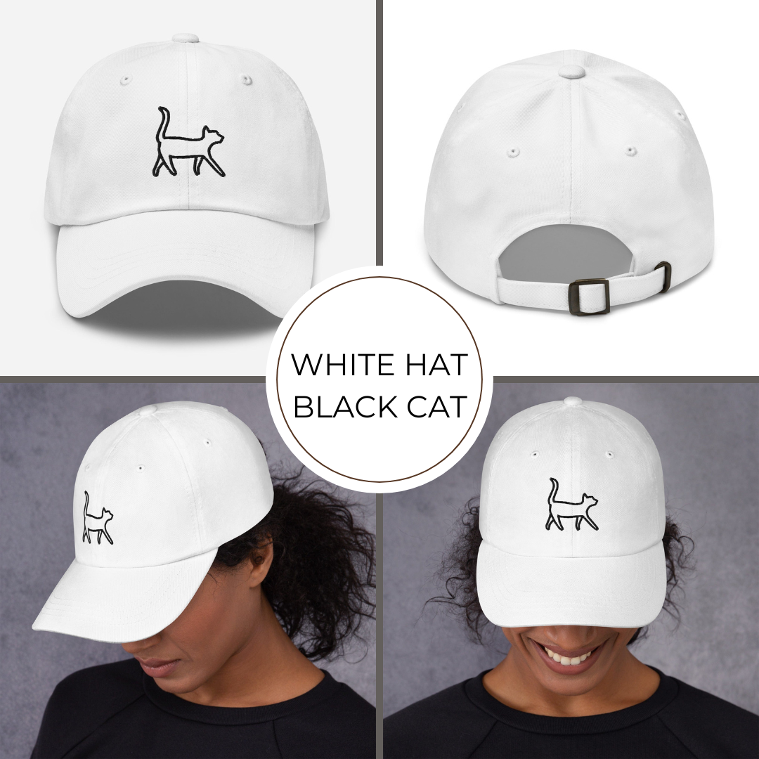 White baseball cap with black cat icon worn by a person on a gray background