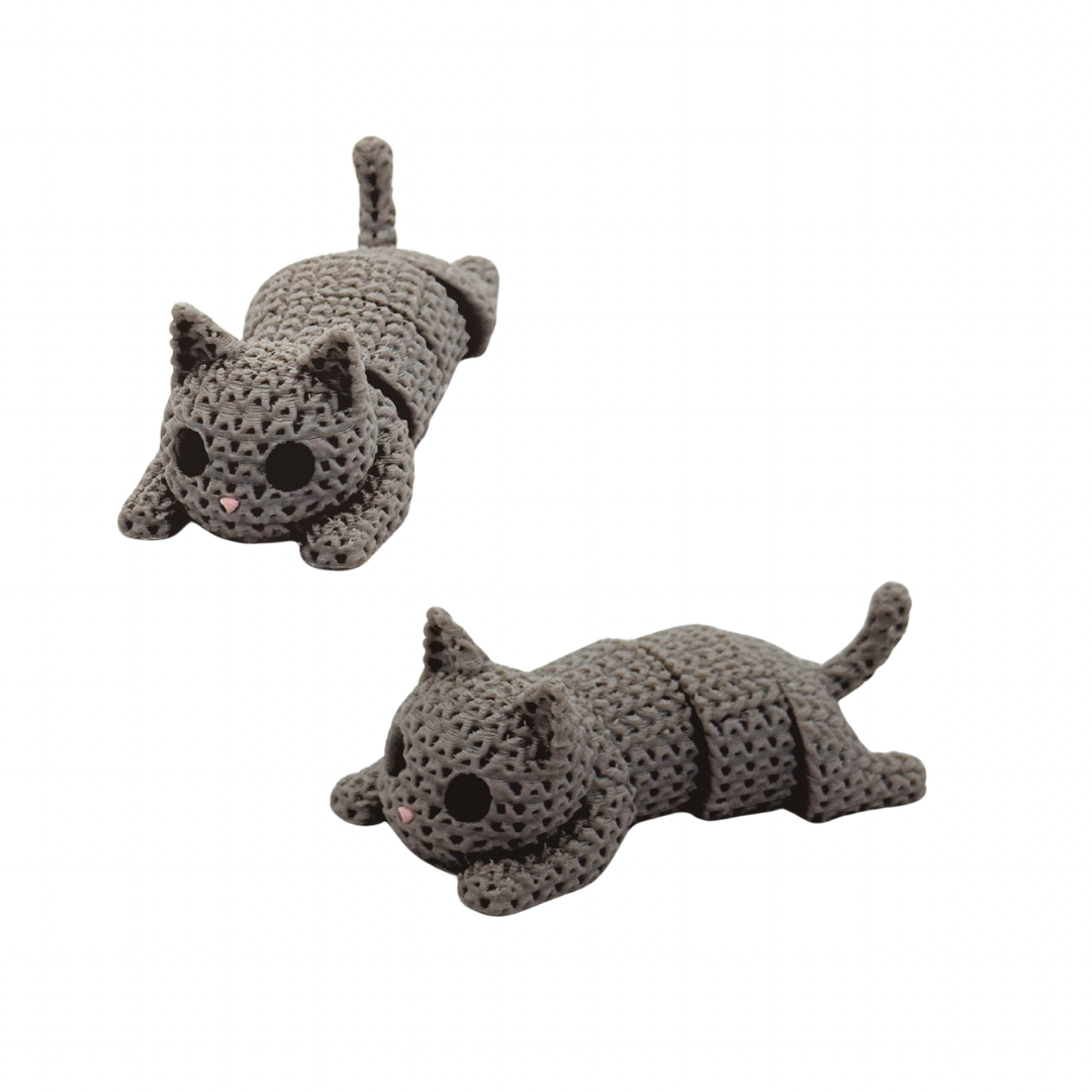 Two gray crochet cat fidget desk toys on a white background