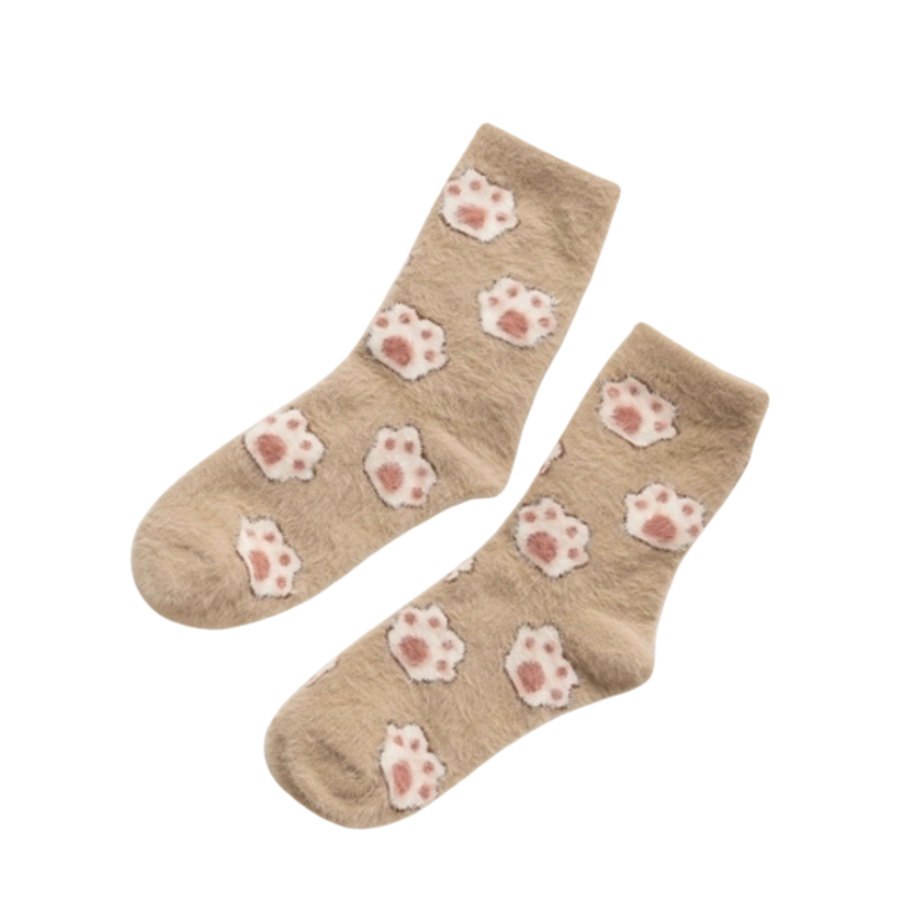 Beige socks with pink paw prints on a white background
