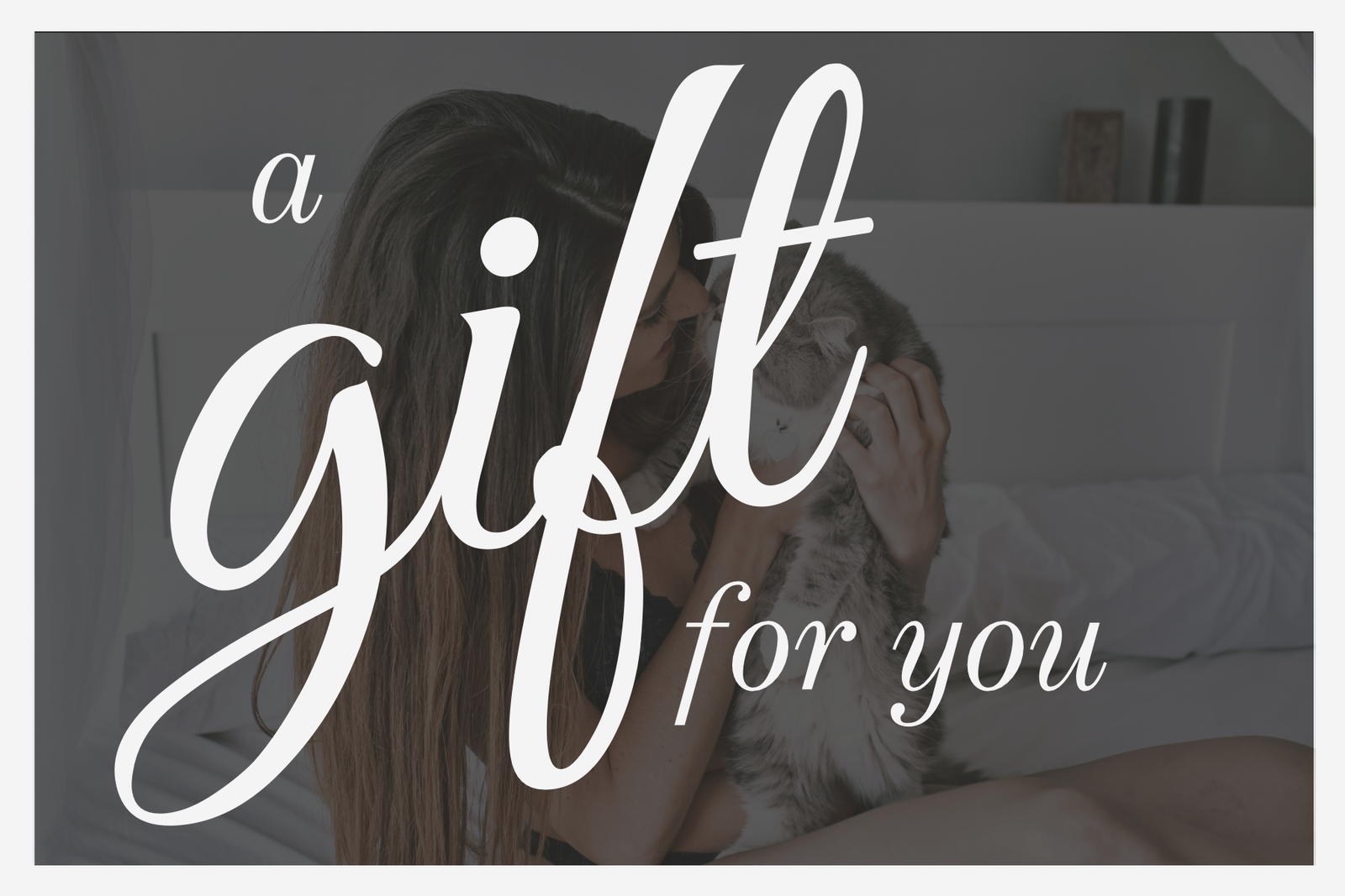 Text 'a gift for you' over a blurred background of two people embracing.