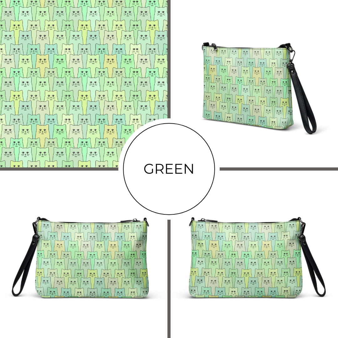 Green patterned crossbody bag with cat design on a white background