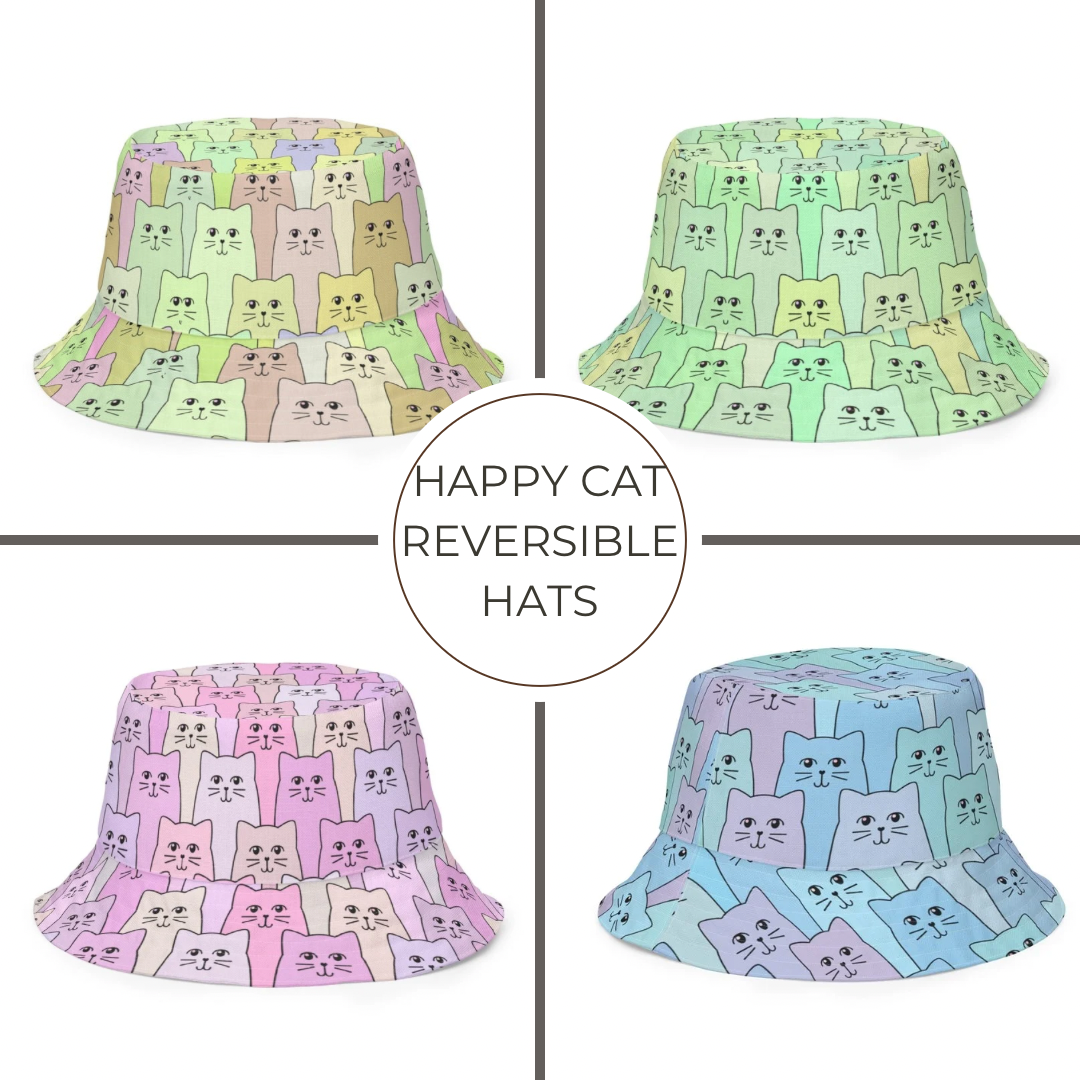 Four reversible bucket hats with cat patterns on a white background