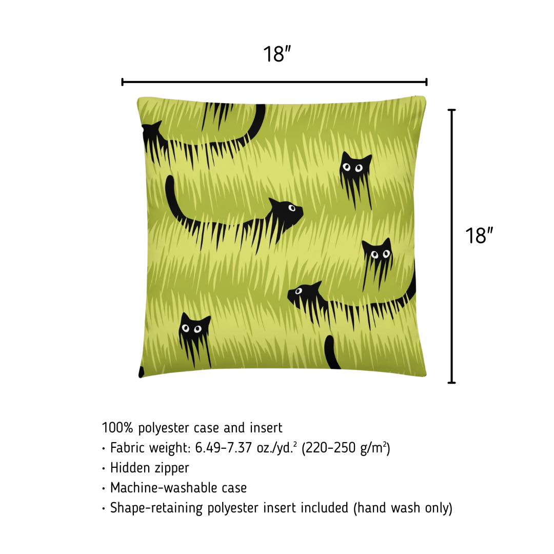 Green pillow with black cat pattern and measurements on a white background