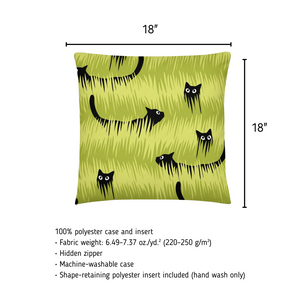 Green pillow with black cat pattern and measurements on a white background