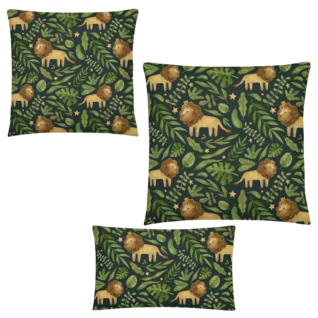 Three green pillows with lion and leaf pattern on a white background