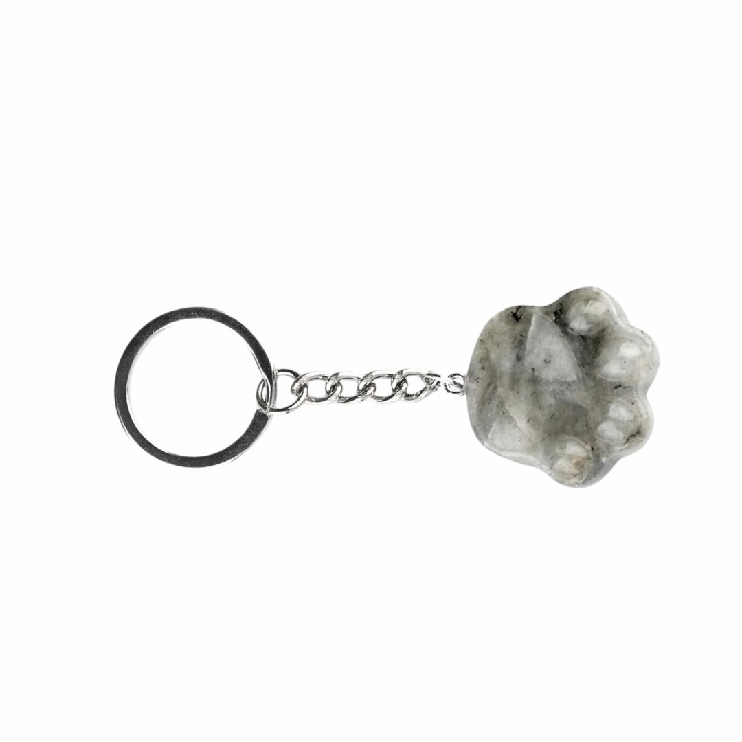 A paw-shaped keychain featuring a natural gray stone pendant attached to a silver metal chain and a black split ring, shown on a plain white background.