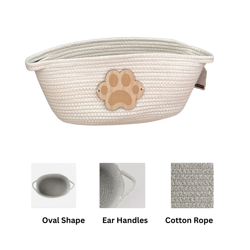 Beige pet basket with a paw design on a white background