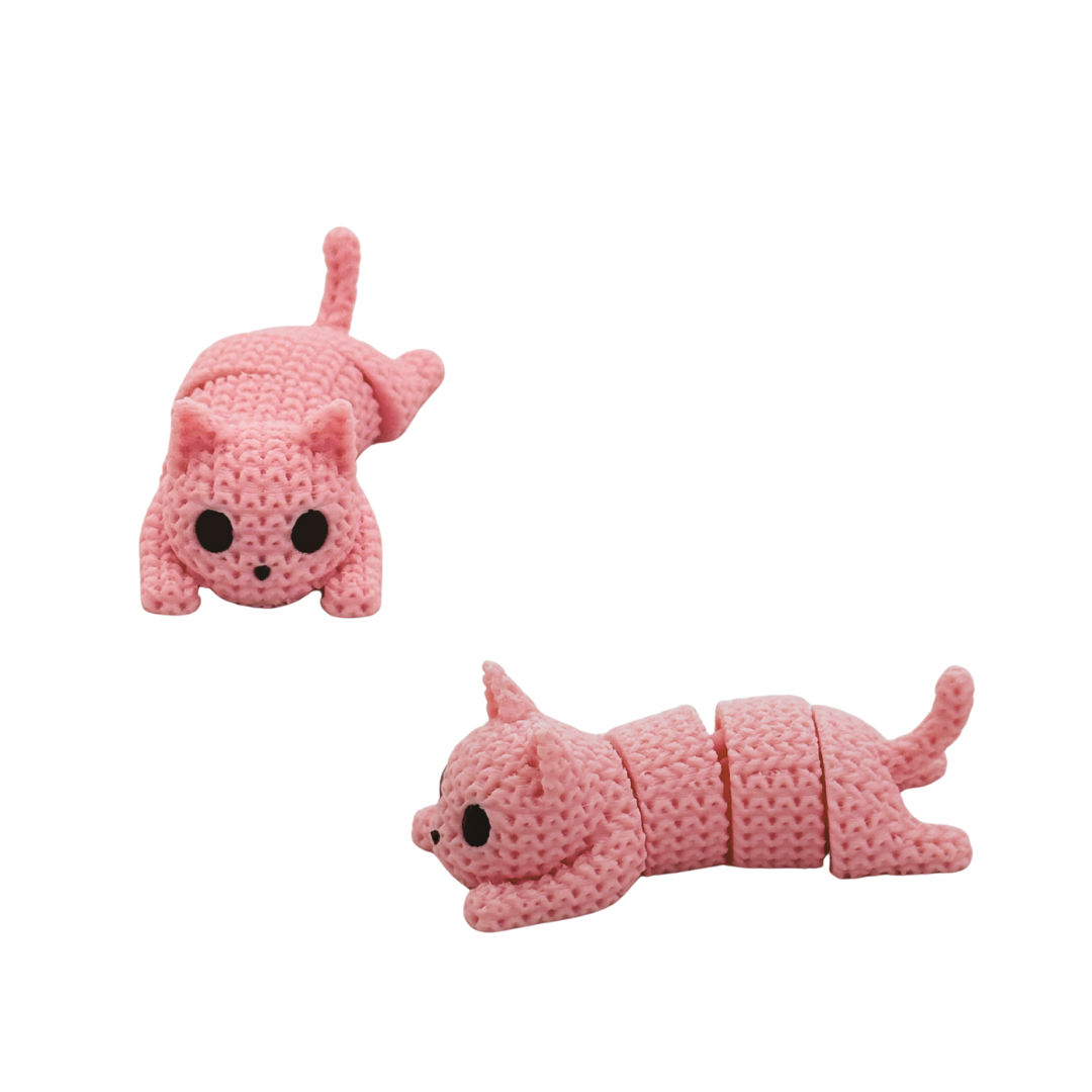 Two pink cat-shaped fidget toys on a white background