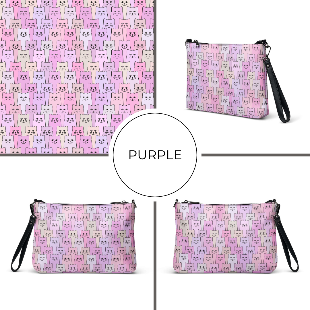 Pink crossbody bag with cat pattern and black strap on a white background