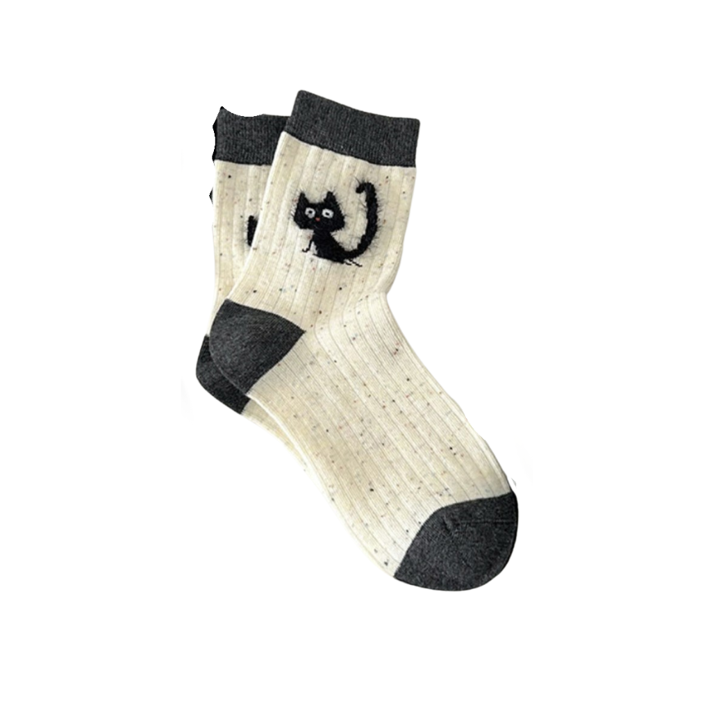Pair of socks with silly quirky black cat design on a white background