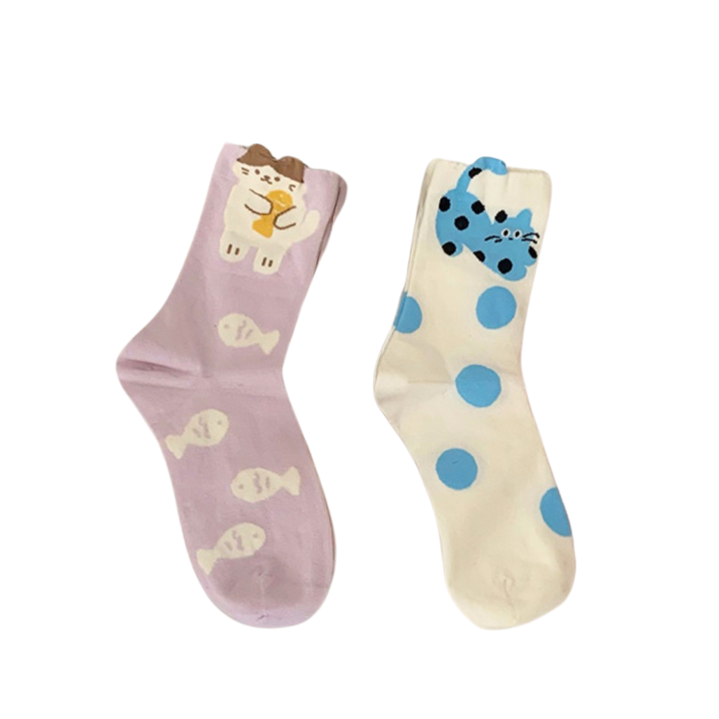 Two pairs of socks with cartoon cat designs on a white background