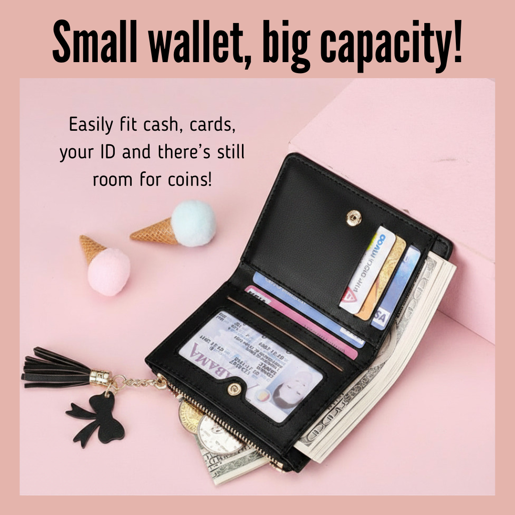 Black Three Cat wallet with card slots and cash compartment on a pink background