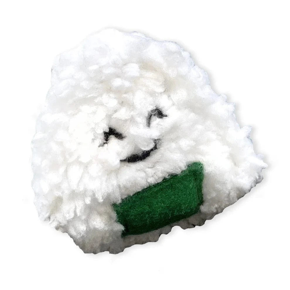 White fluffy sushi toy with a green base on a white background