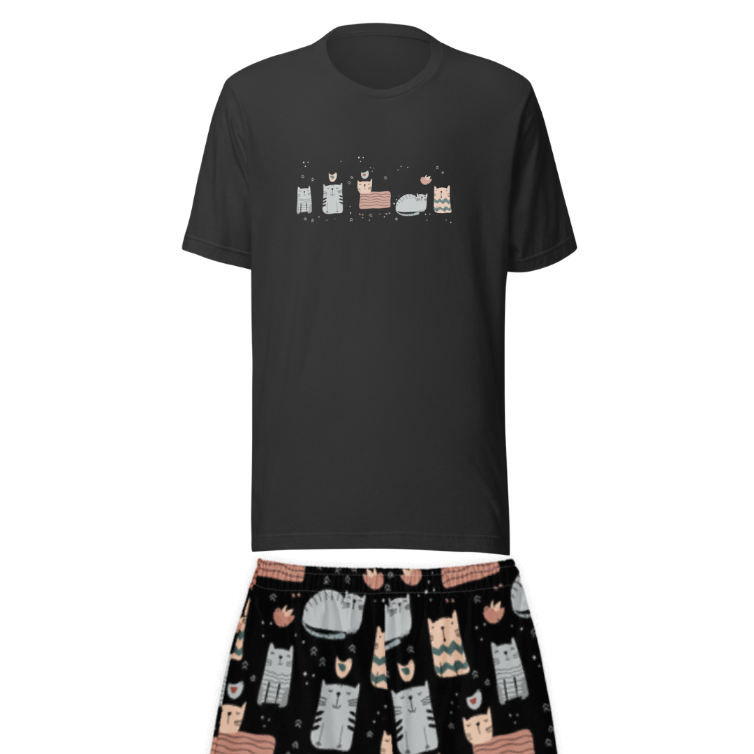A two-piece pajama set displayed on a white background, featuring a black short-sleeve t-shirt with a cartoon cat graphic across the chest and matching pants