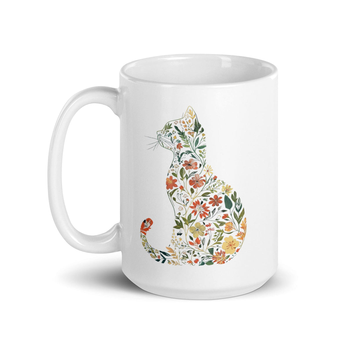 A white ceramic mug with a colorful floral silhouette of a cat on the side.