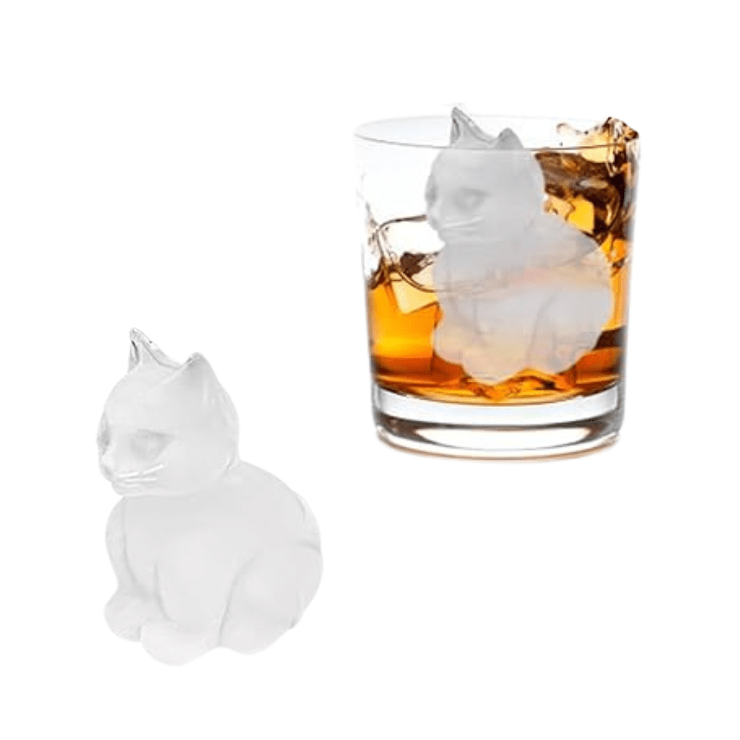 Cat shaped ice cube next to glass full of liquid with cat shaped ice cube featured on white background