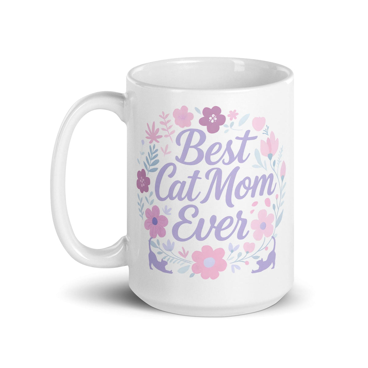 A white ceramic mug with pastel floral design and the text &#39;Best Cat Mom Ever&#39;.