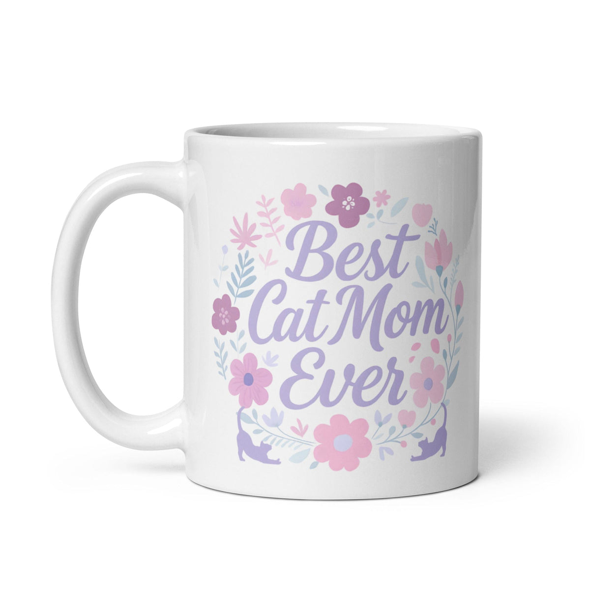 A white ceramic mug with pastel floral design and the text &#39;Best Cat Mom Ever&#39;.