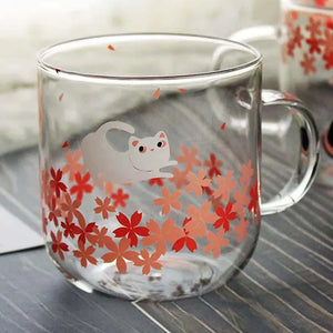https://triple-t-studios.com/cdn/shop/products/triple-t-studios-for-your-habitat-playful-white-cat-glass-cat-mug-sakura-cat-mug-38821641126122_300x.webp?v=1673200152