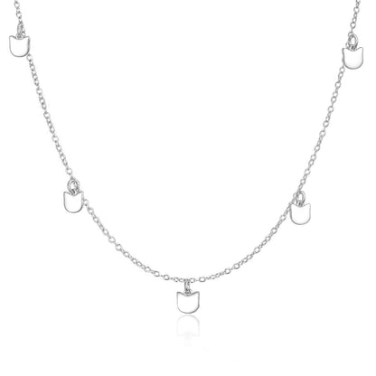 A sterling silver cat charm necklace with multiple charms in a chain link, displayed against a white background.