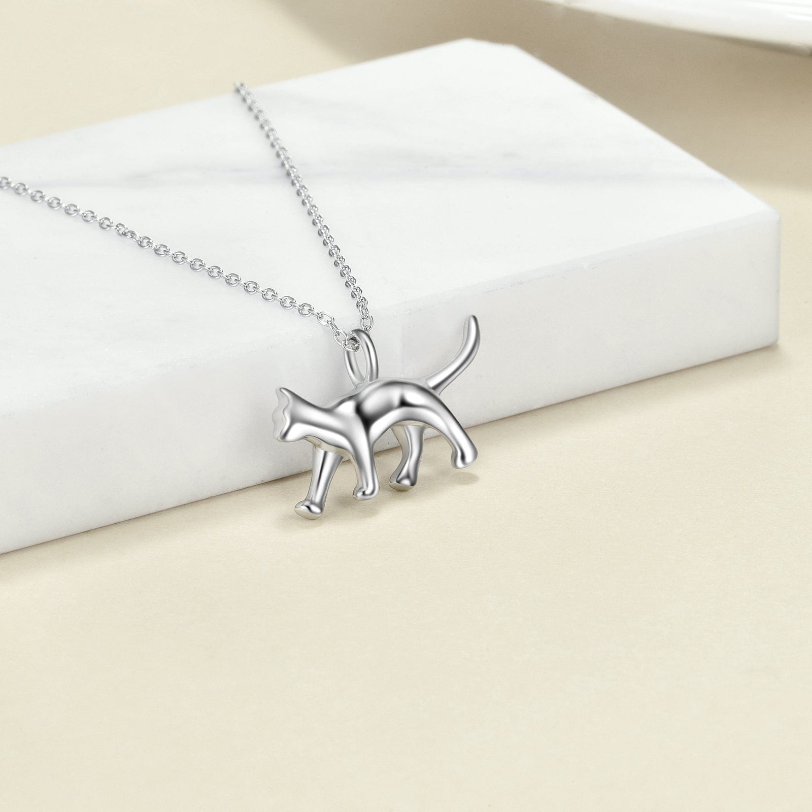 Sterling Silver Cat Necklace flatlay
