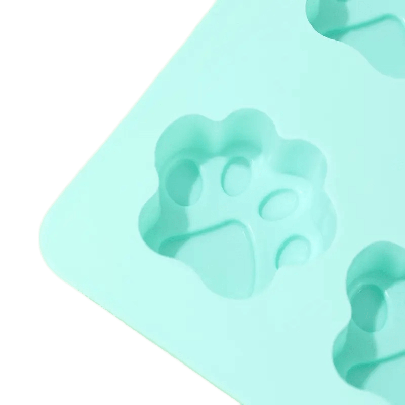 https://triple-t-studios.com/cdn/shop/products/triple-t-studios-silicone-paw-ice-tray-39092964327658_1200x.png?v=1680876059